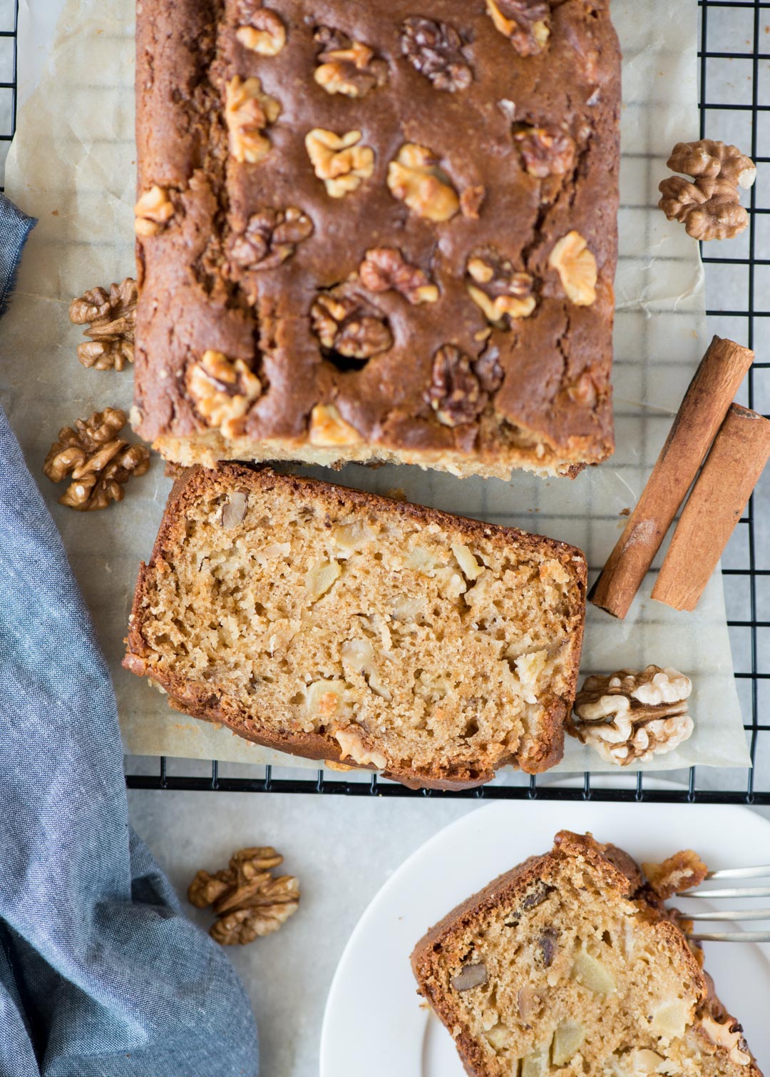 Moist Apple Cake recipe with oil,yogurt, walnut is a perfect cake with your afternoon tea. With a hint of cinnamon, this cake has tender crumbs and chunks of apple in every bite.