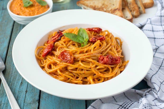 Spaghetti in red chilli pesto and roasted tomatoes