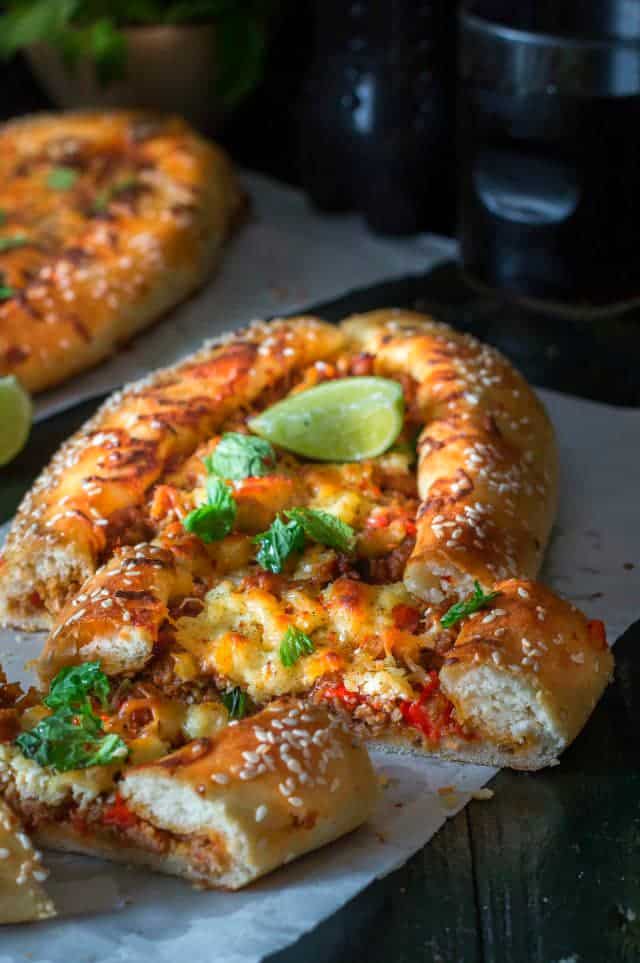 Cross-sectional view of toppings of a turkish lamb pide