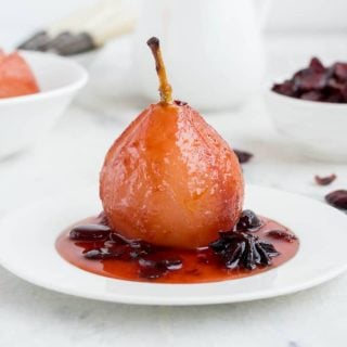 Poach pears in cranberry sauce