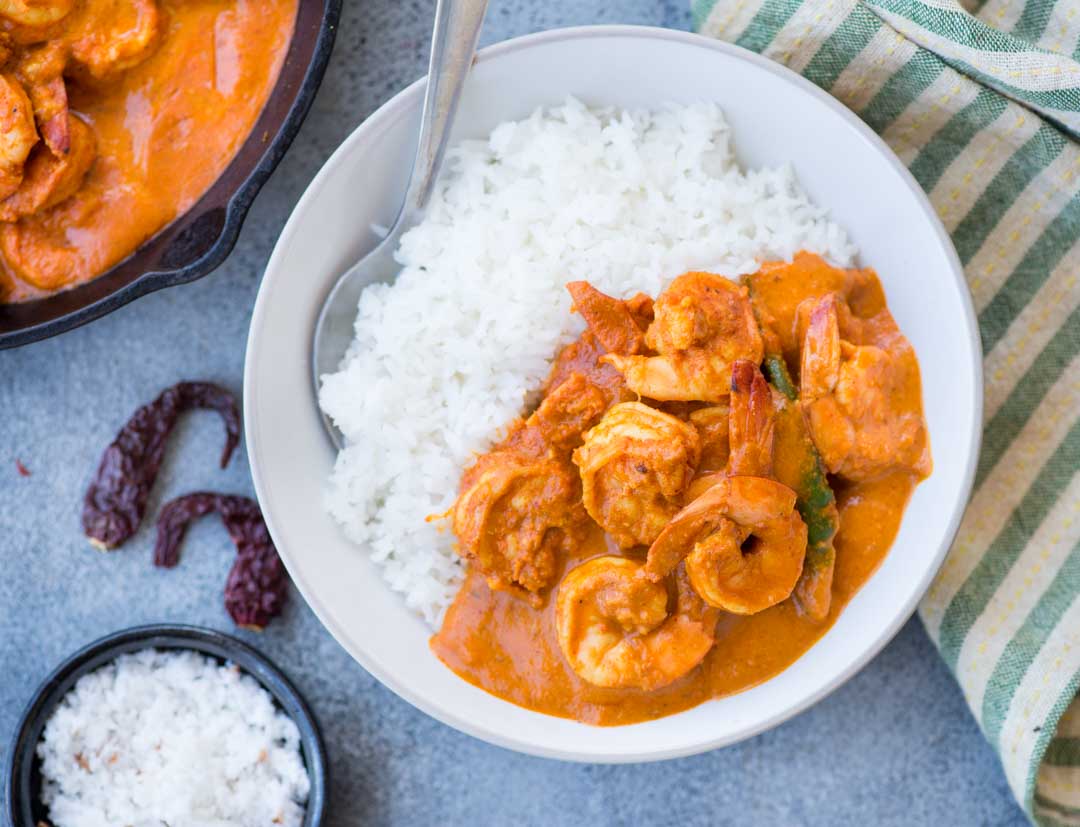 Serve this tangy spicy Prawn Curry with rice for a complete meal.