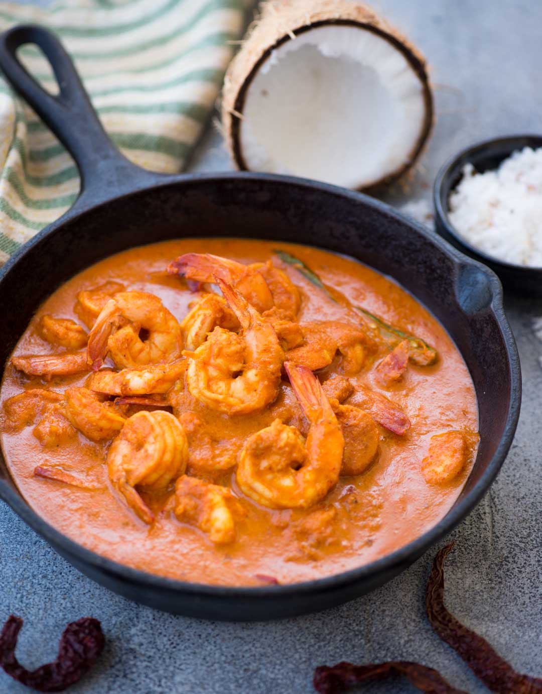 Prawns cooked in a spicy and tangy coconut based gravy. Goan Prawn curry is quite popular in the Western part of India. It goes very well with steamed white rice.