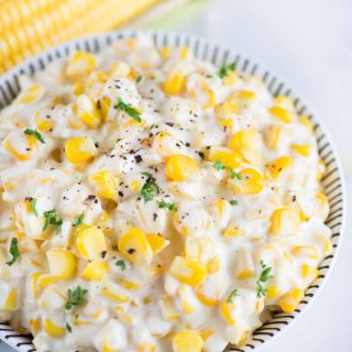 Learn how to make Creamed Corn from scratch. Fresh Corn, butter, flour roux and half& half is all you need to make this easy and creamy creamed corn recipe.