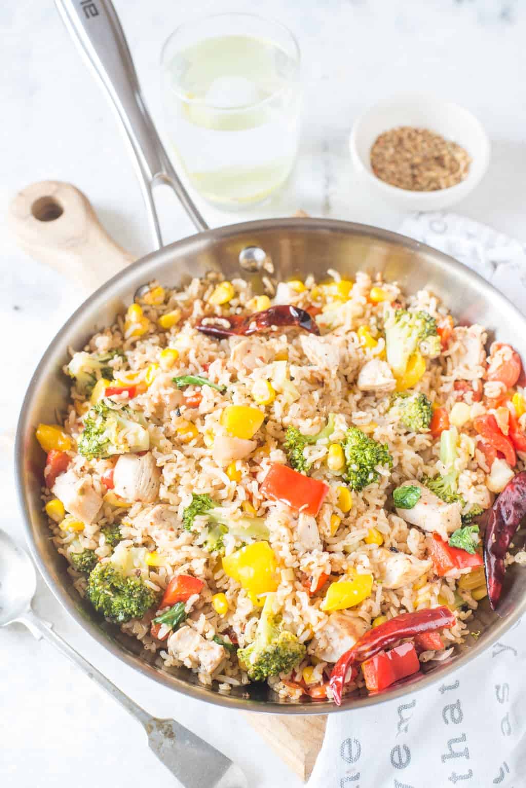 This Brown Rice Recipe with Chicken and vegetables is healthy, filling and easy to make. When made with leftover rice and precut vegetables, it would take less than 15 minutes.