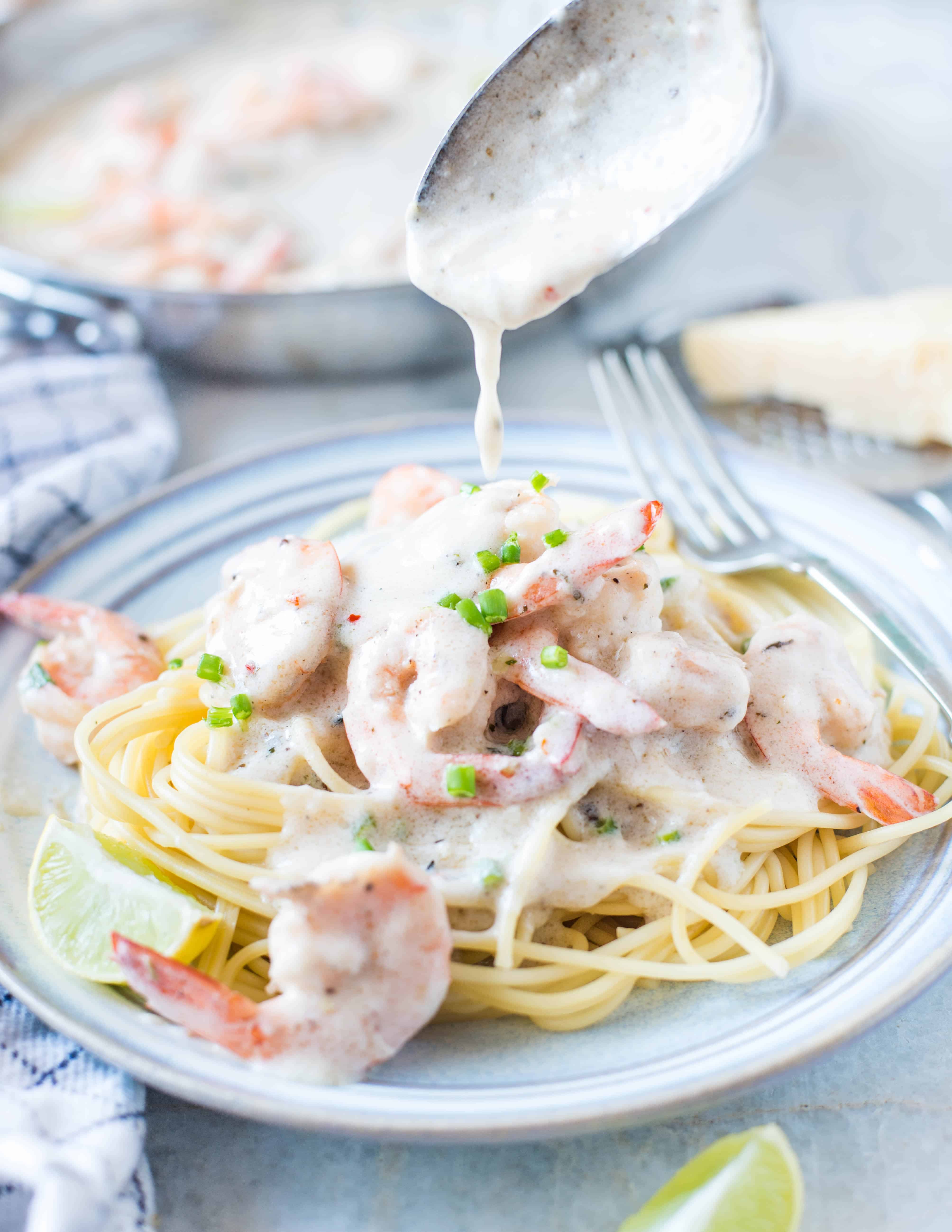 Easy and quick Lemon Garlic Shrimp ready in flat 20 minutes. Toss in your favourite pasta and your Creamy Lemon Garlic Shrimp Pasta is on the table in no time.