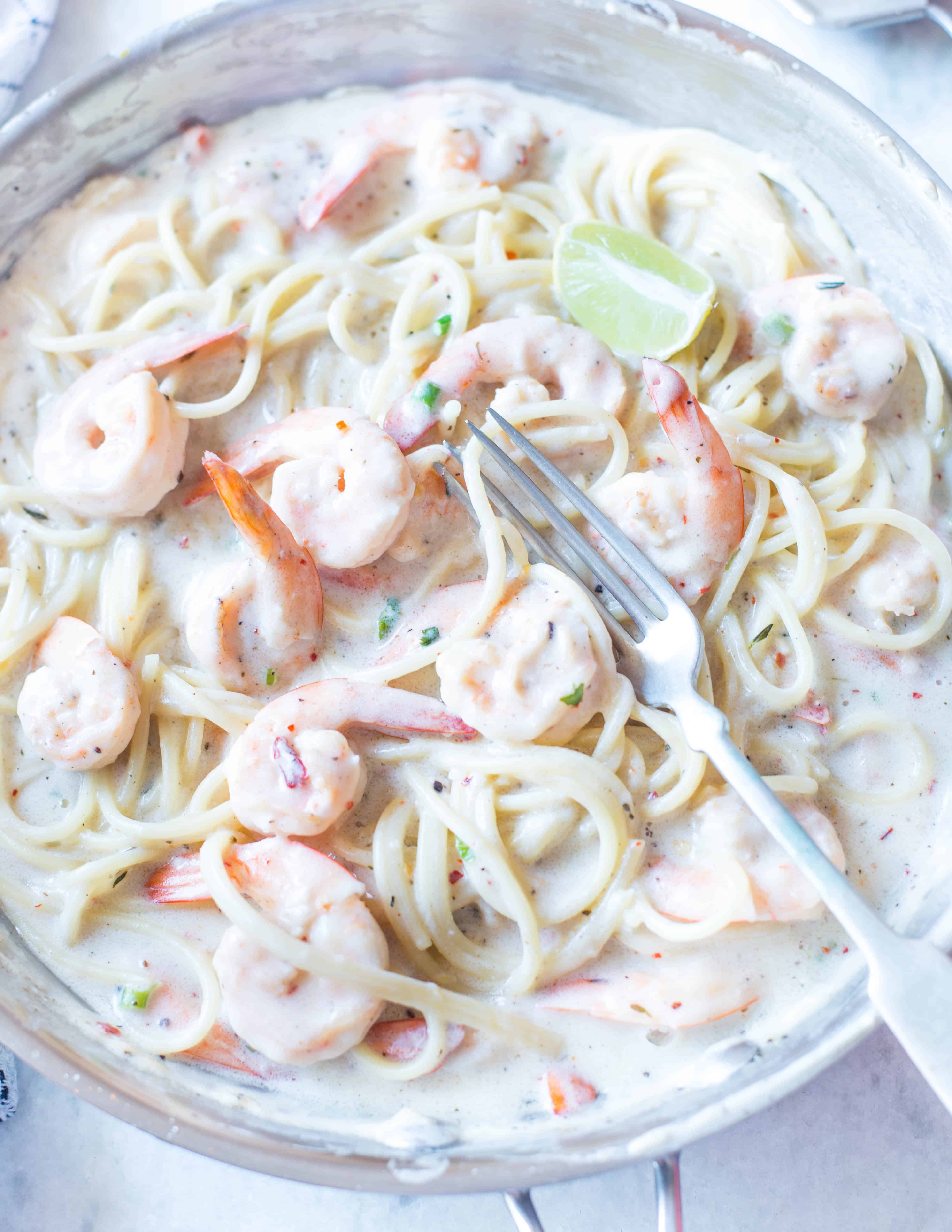 Easy and quick Lemon Garlic Shrimp ready in flat 20 minutes. Toss in your favourite pasta and your Creamy Lemon Garlic Shrimp Pasta is on the table in no time.