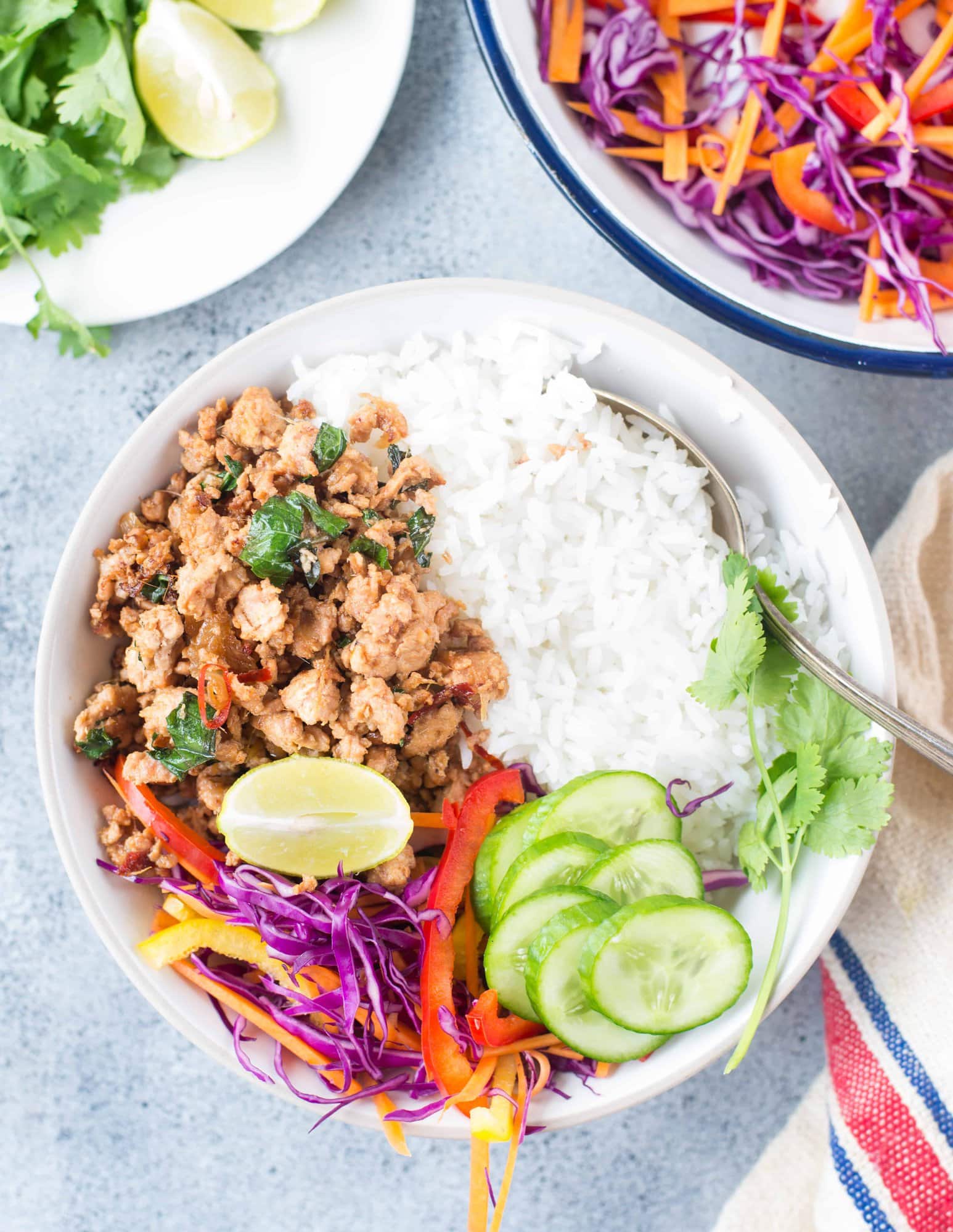 Thai Basil Chicken, this stir fry is spicy, flavourful with real Thai flavour from Thai basil and takes only 15 minutes to make. Serve it with a bowl of jasmine rice and a fried egg or fresh salad.
