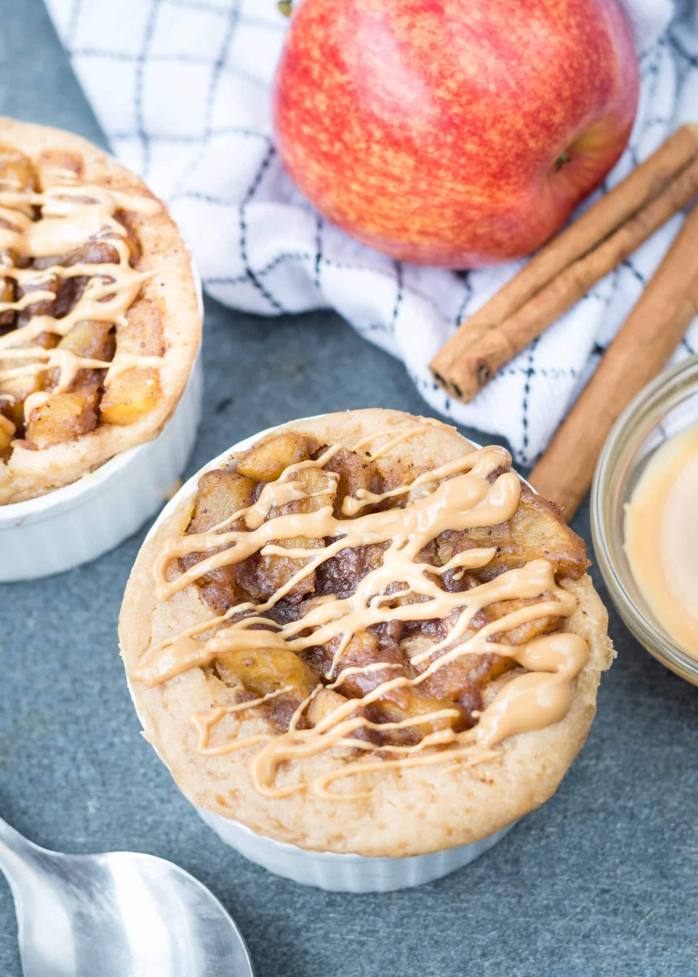 This super moist 2 minutes Eggless Apple Peanut Butter Microwave Mug Cake is a quick fix dessert for your sudden sweet craving. 