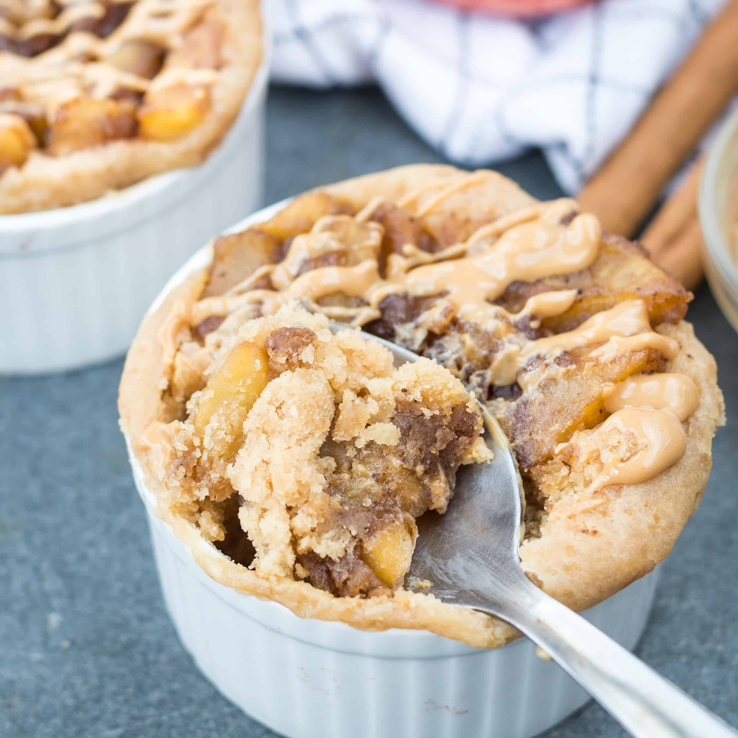 This super moist 2 minutes Eggless Apple Peanut Butter Microwave Mug Cake is a quick fix dessert for your sudden sweet craving. 