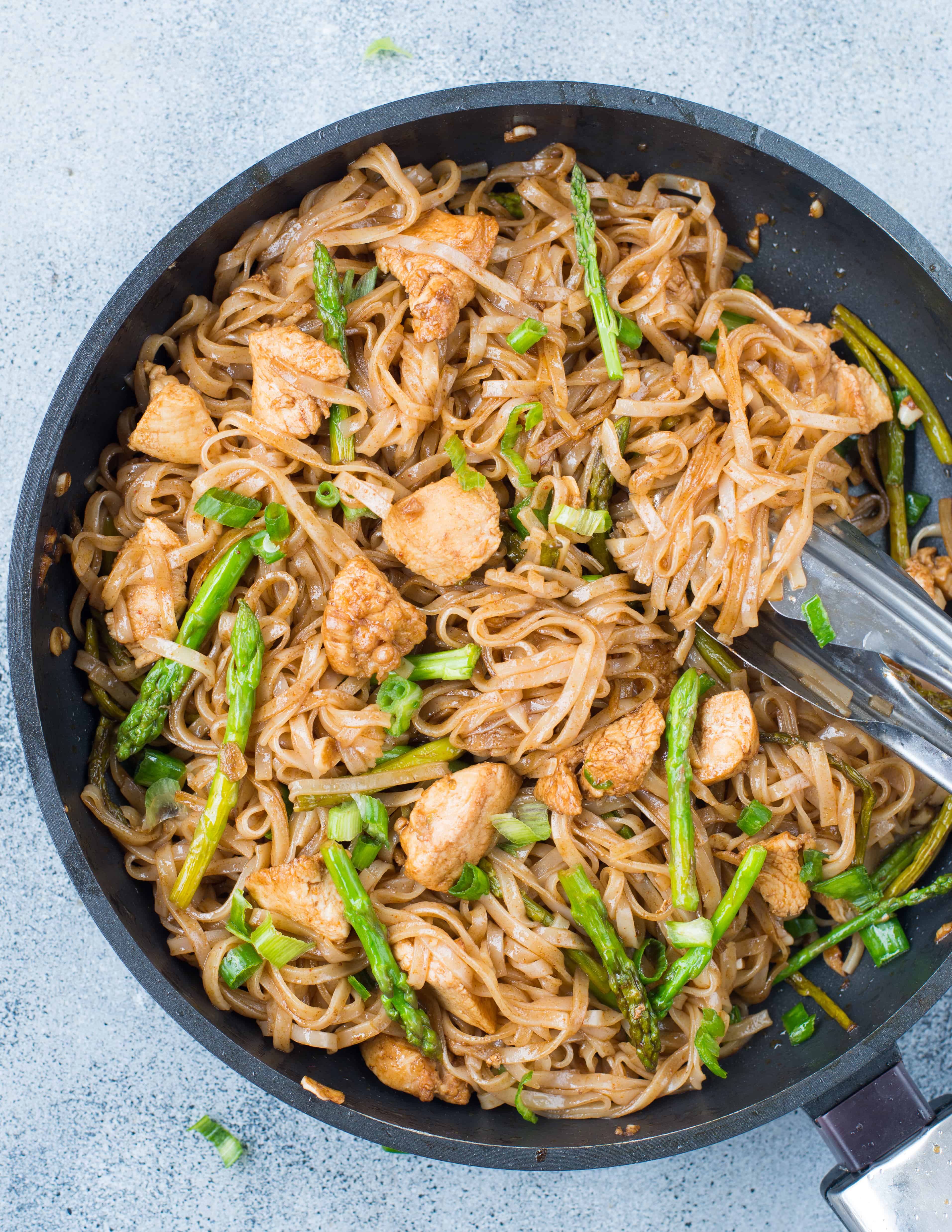 This Saucy Chicken Asparagus Stir fry Noodles with succulent pieces of chicken and crunchy asparagus is bursting with Asian flavors. This 30-minute Rice Noodles Stir Fry is going to be a perfect weeknight dinner.