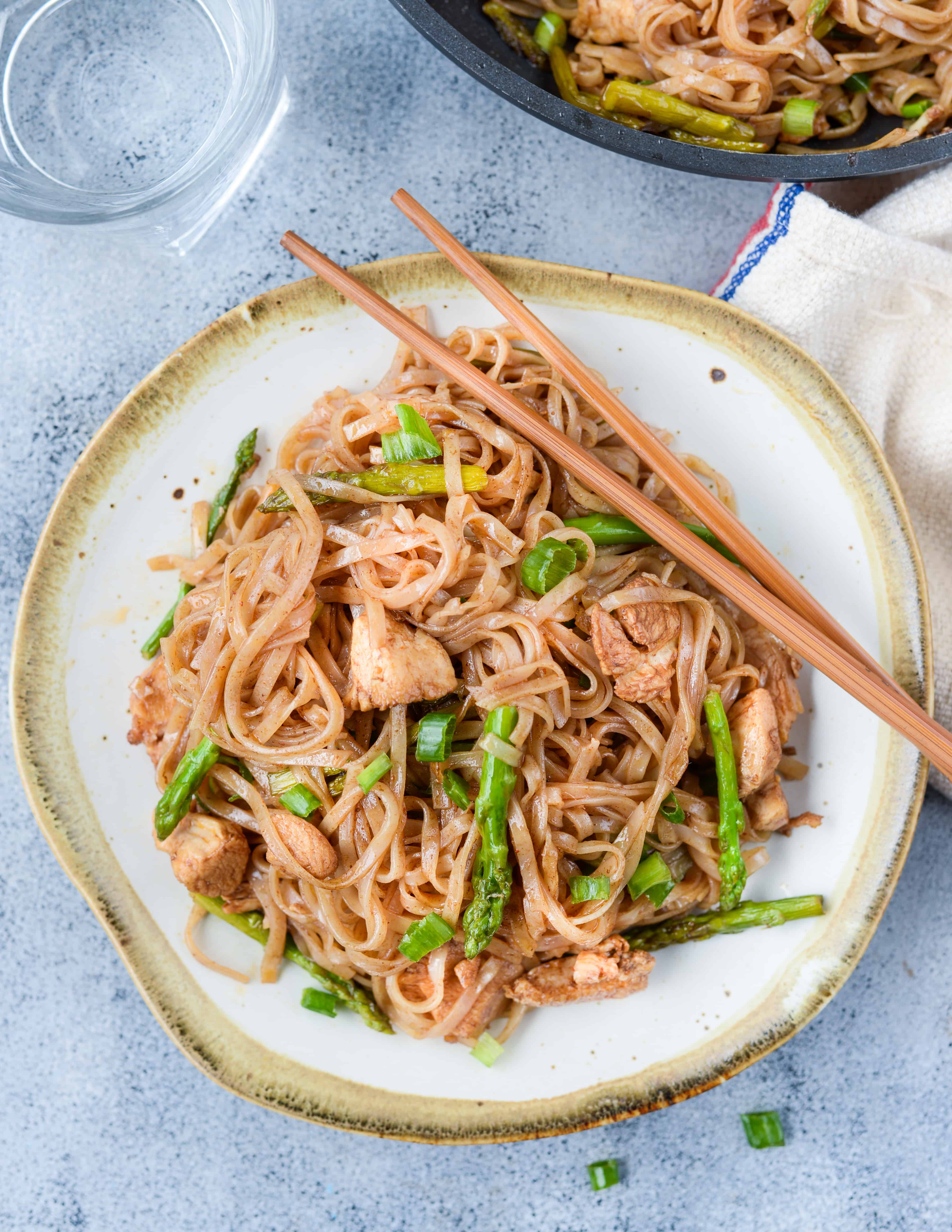 This Saucy Chicken Asparagus Stir fry Noodles with succulent pieces of chicken and crunchy asparagus is bursting with Asian flavours. This 30-minute Rice Noodles Stir Fry is going to be a perfect weeknight dinner.