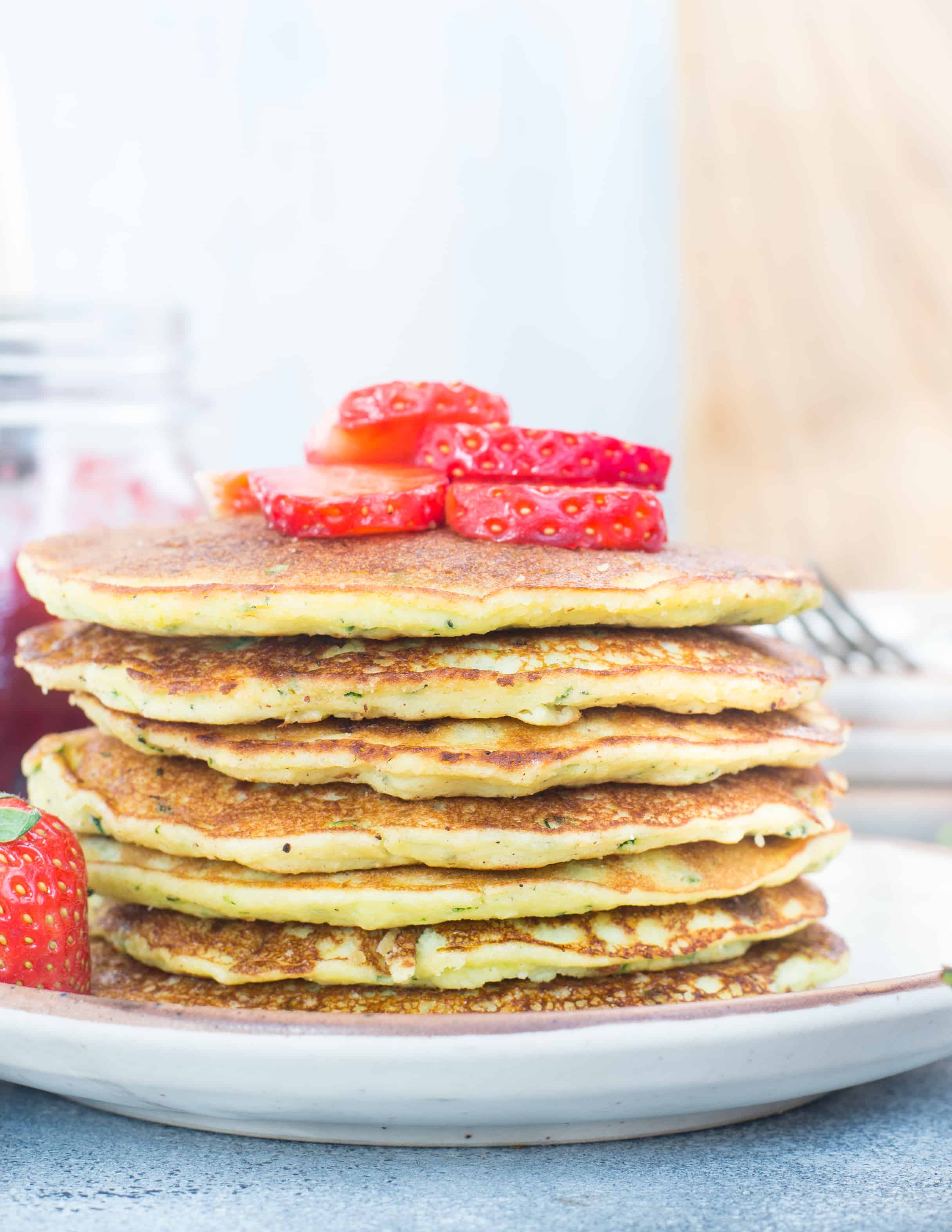 These  Low Carb Coconut Flour Pancakes with zucchini are fluffy, delicious and Keto friendly. Top these pancakes with fresh berries or Honey(Non-Keto) for a delicious breakfast.