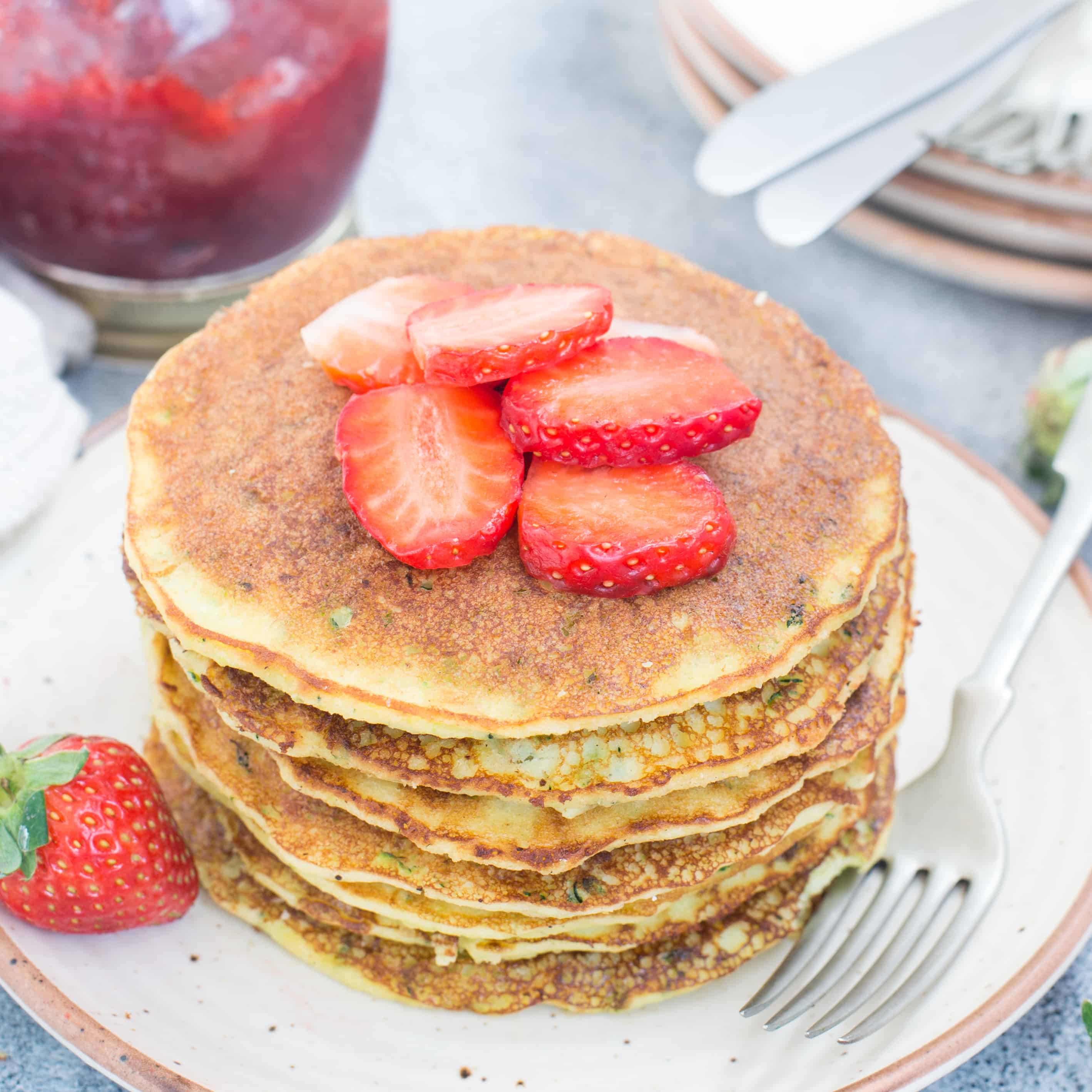 These  Low Carb Coconut Flour Pancakes with Cream cheese and zucchini are fluffy, delicious and Keto friendly. Top these pancakes with fresh berries or Honey(Non-Keto) for a delicious breakfast.