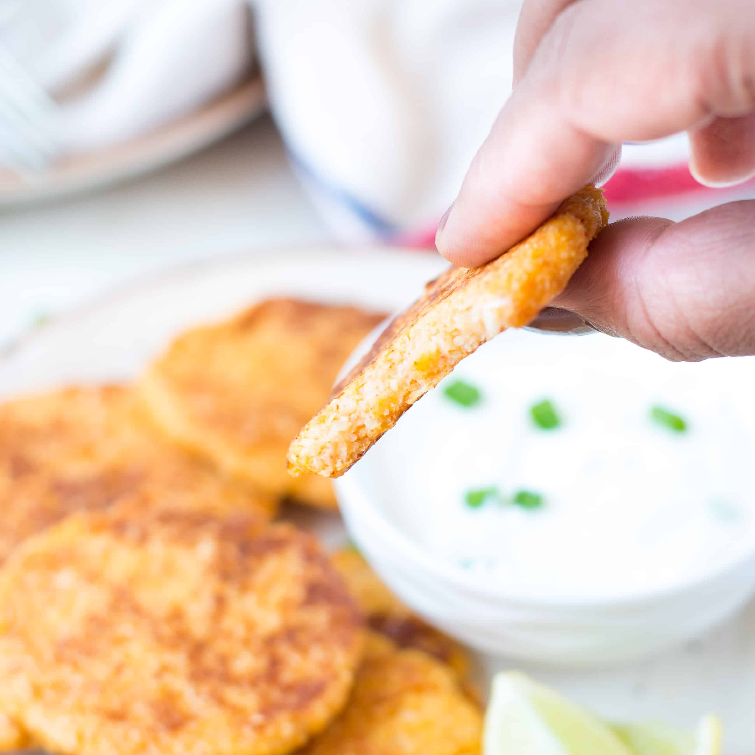 Parmesan Cauliflower Fritter dipped in a mayo dip