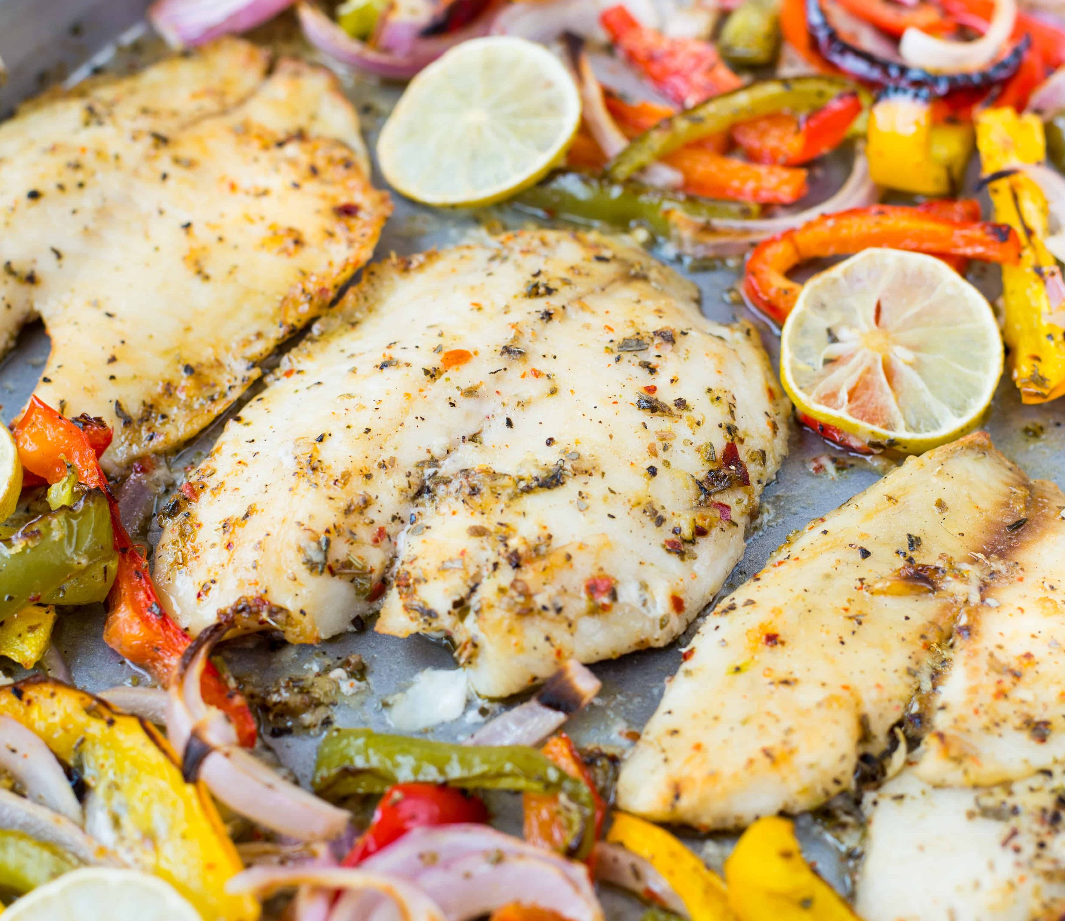 Tilapia, onions and peppers baked together in a delicious lemon garlic sauce. 