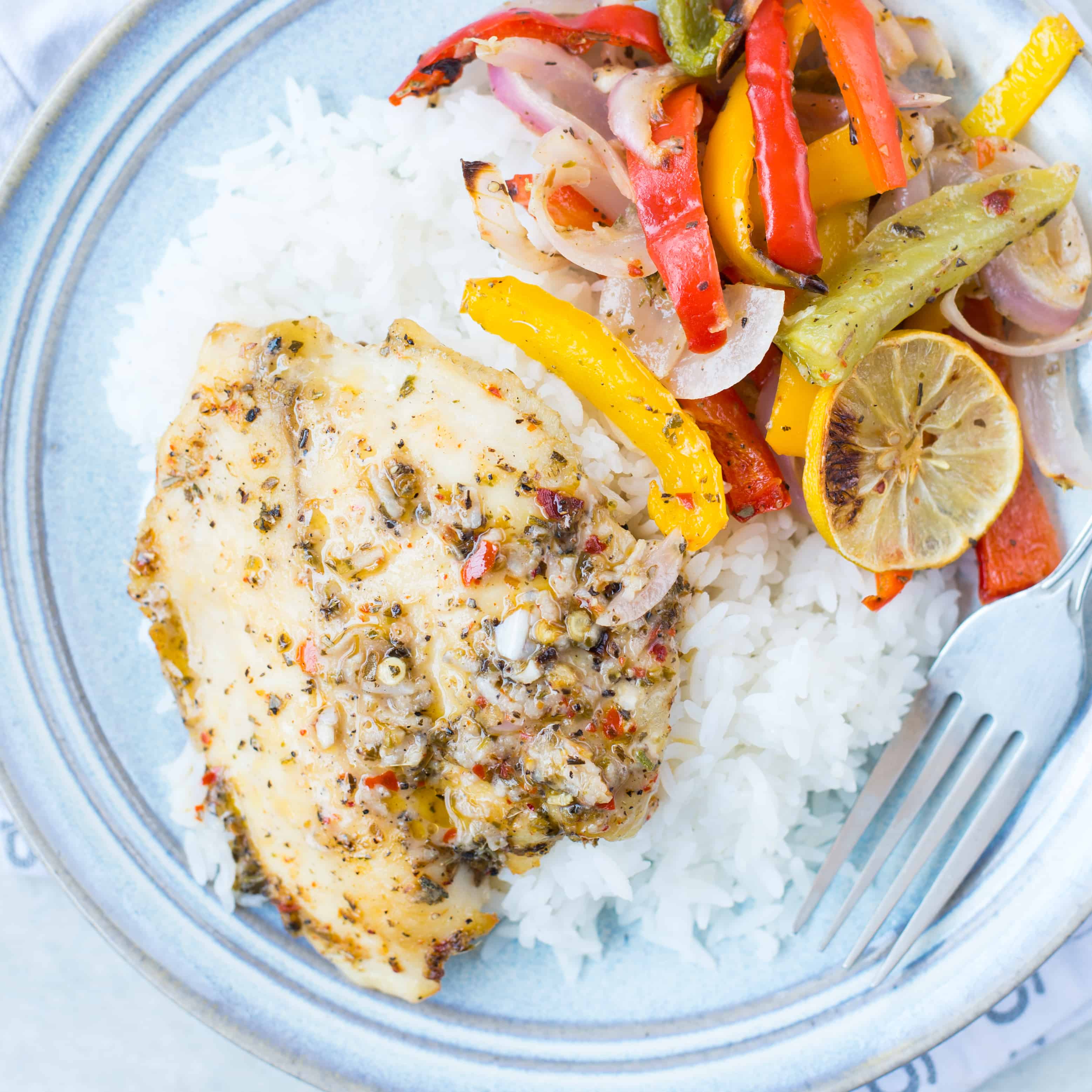 Rice, Tilapia, veggies and a delicious Lemon butter Sauce to drizzle on top. 