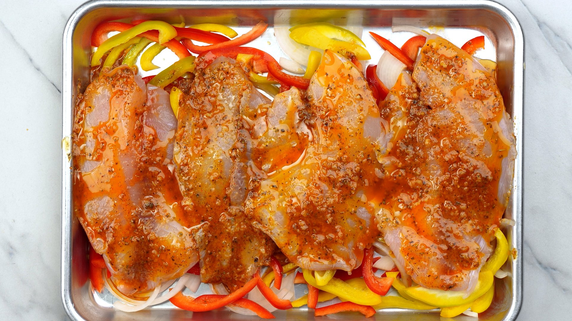 Spread marinade generously on both the sides. 