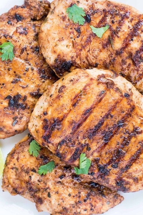 Chicken Breast marinated in Buttermilk, garlic, herb, spice marinade and grilled to perfection. This Easy Grilled Chicken Breast With Buttermilk Marinade is super moist and Juicy. Best for a quick weeknight dinner or for summer barbeques. 