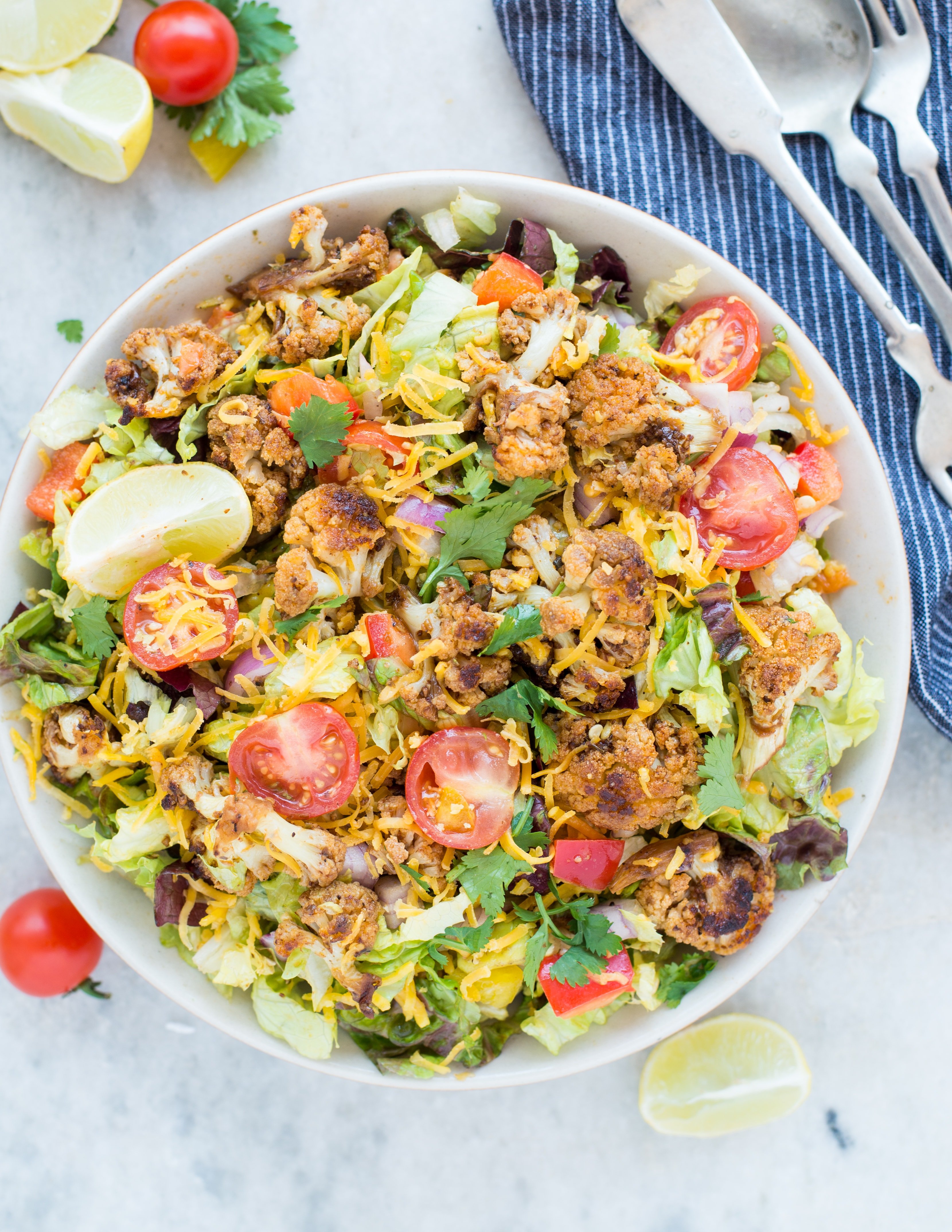  Healthy Taco Salad with Cauliflower is your answer for a low carb taco salad recipe. It is easy and comes together in 20 minutes. Perfect for a potluck.