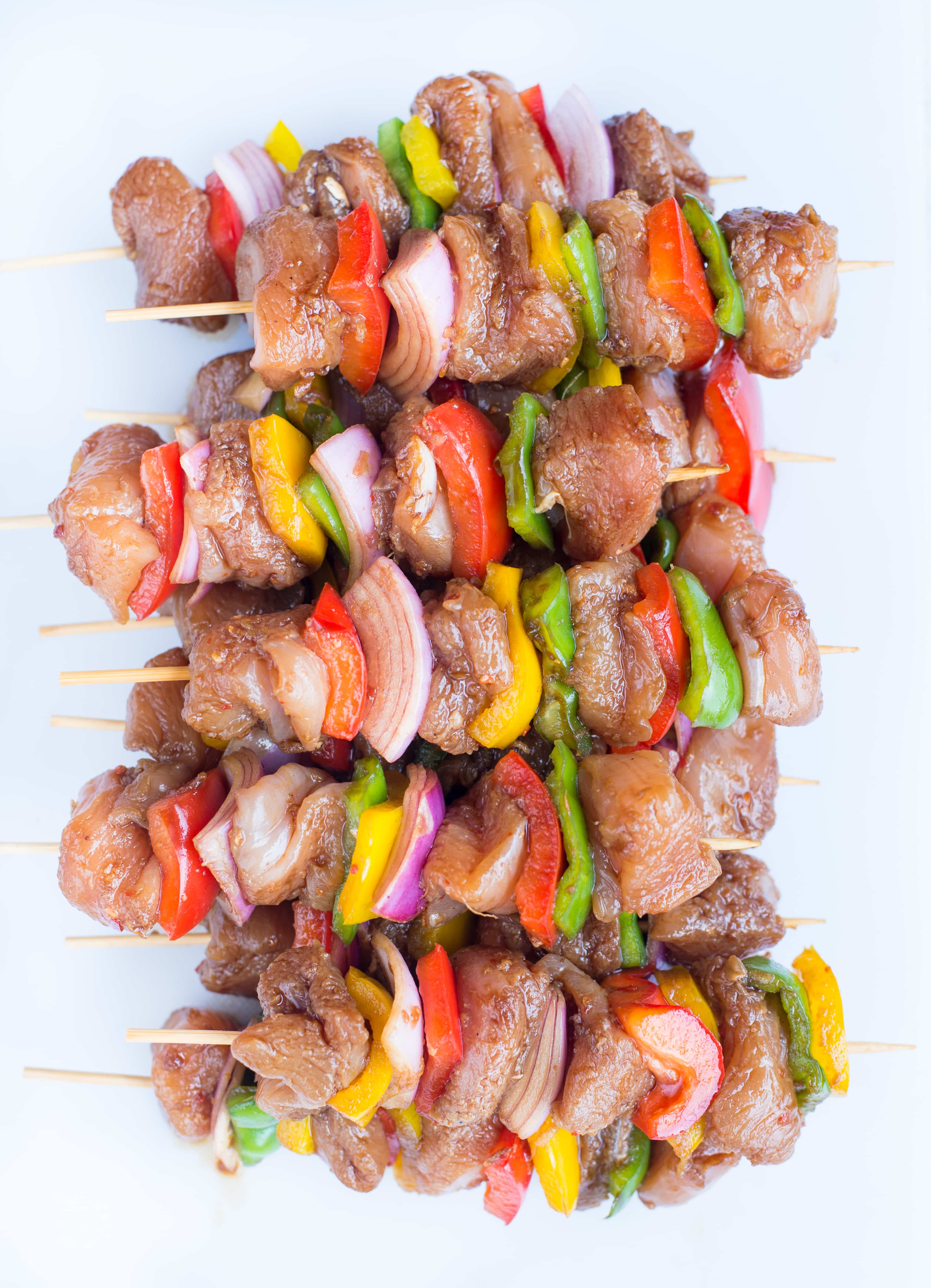 These amazing Teriyaki Chicken Skewers with sweet and savoury Teriyaki Sauce are absolutely delicious. Tender Chicken, crunchy peppers and Onion, these grilled chicken skewers are perfect appetizers for your summer barbecue. 
