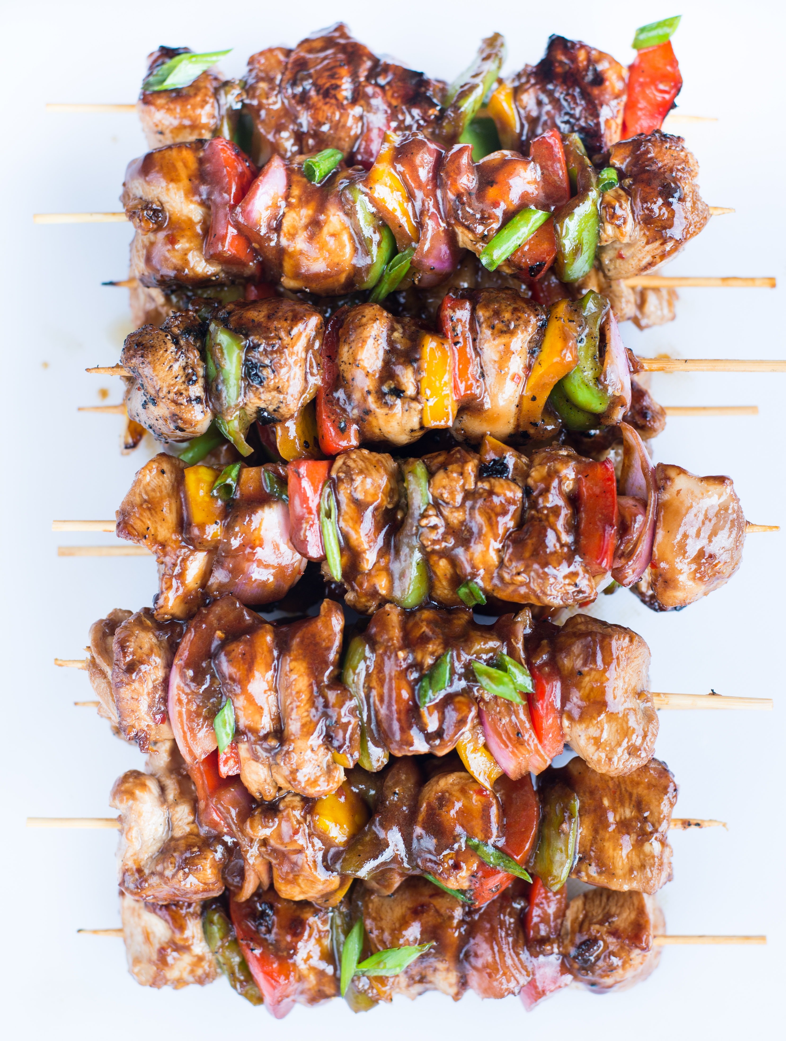 These amazing Teriyaki Chicken Skewers with sweet and savoury Teriyaki Sauce are absolutely delicious. Tender Chicken, crunchy peppers and Onion, these grilled chicken skewers are perfect appetizers for your summer barbecue. 