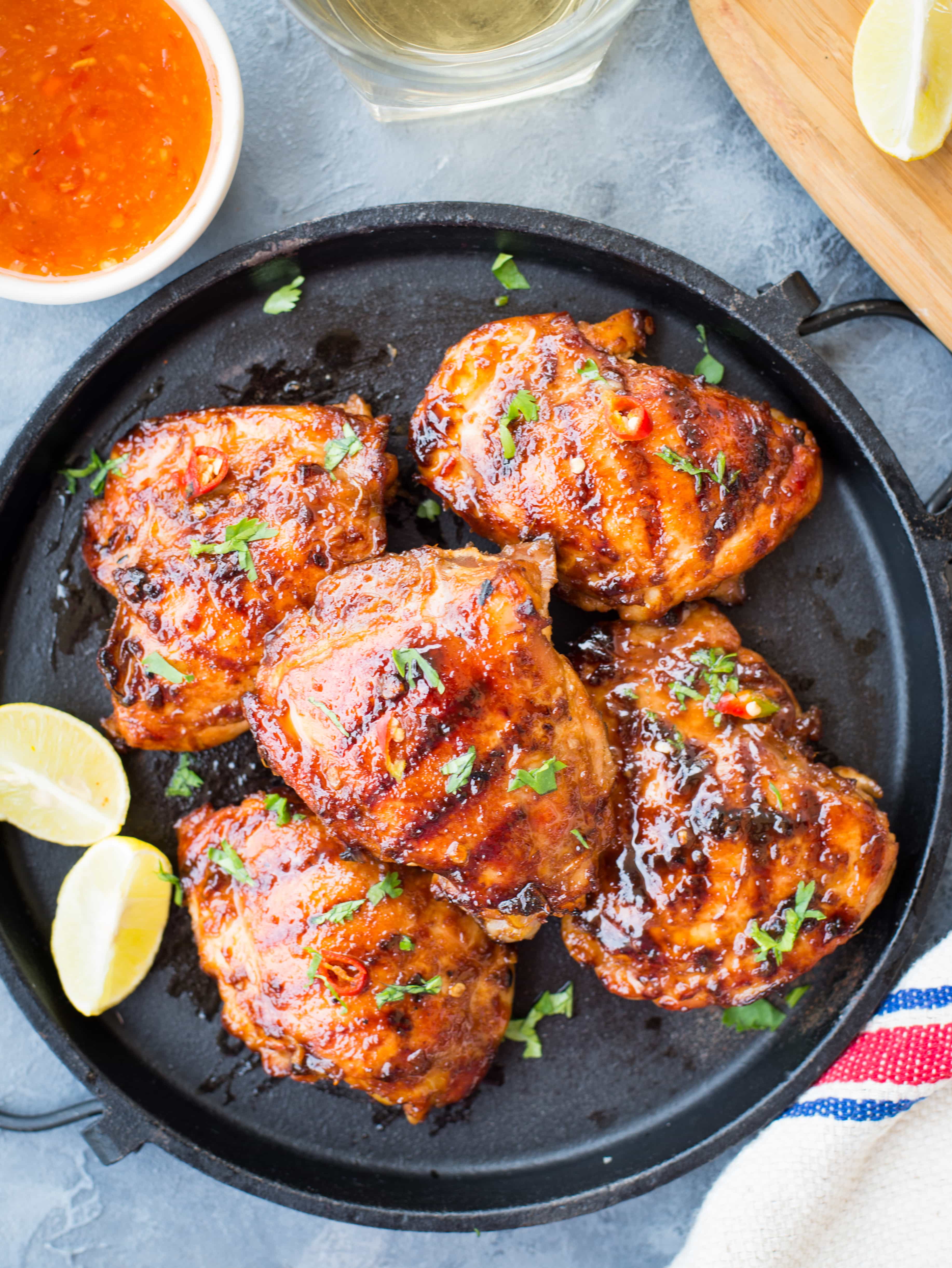 This Sweet and Spicy Thai Grilled Chicken has real Thai flavours. Chicken thighs marinated in Thai Sweet Chili Sauce, Lemongrass, fish sauce and grilled to perfection. 