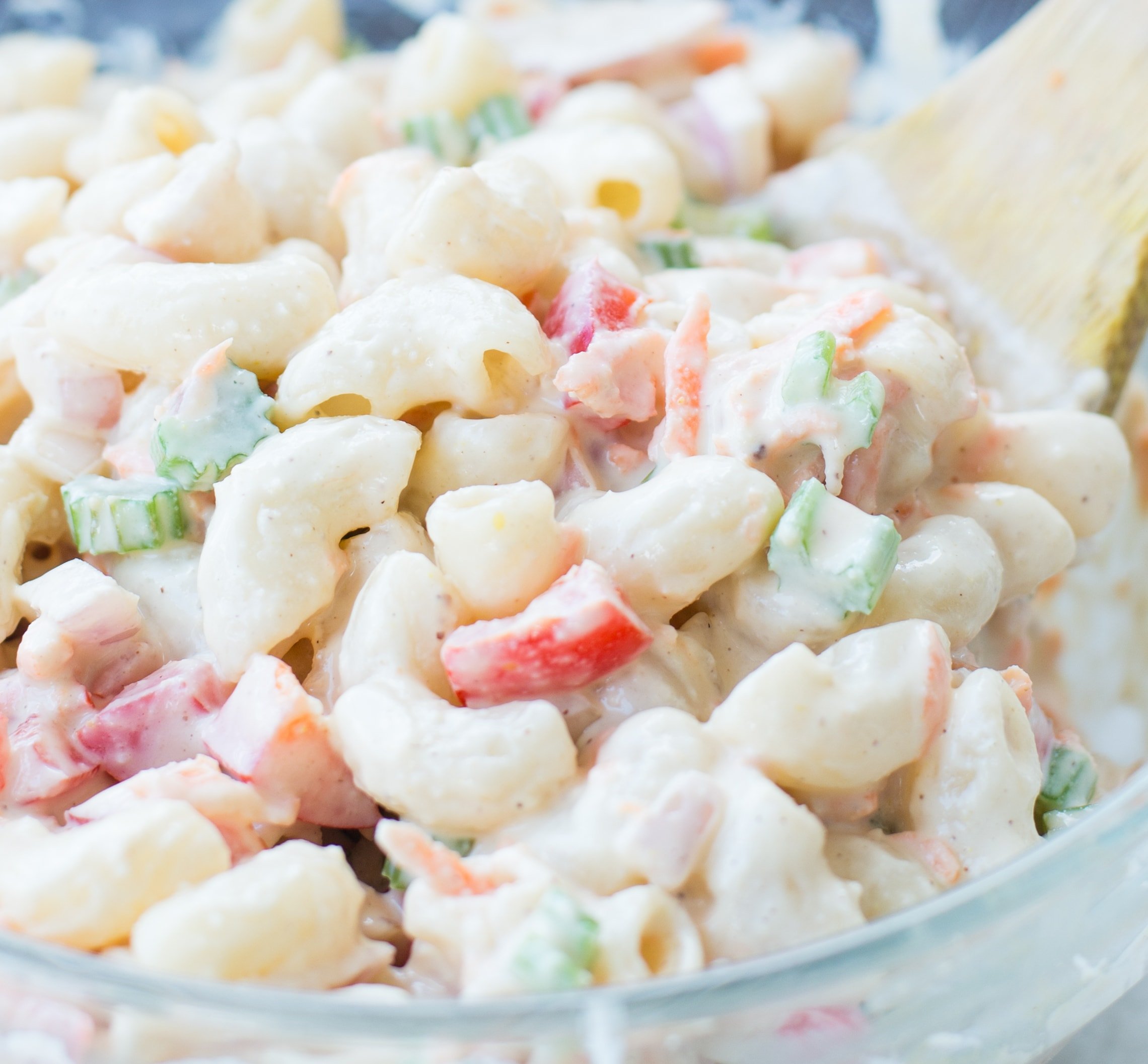 Delicious Vegan Macaroni Salad is a perfect side for Picnic, potluck or Barbecue. This Vegan Pasta salad is creamy with crisp vegetables and a light Tahini Cashew Dressing.