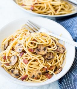 Garlic Mushroom Spaghetti With Bacon is an easy weeknight dinner, made with just handful of ingredients. This Mushroom Pasta is packed with flavour and takes just 20 minutes from start to end.