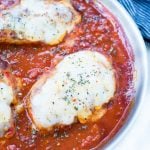 This Easy Mozzarella Chicken in homemade tomato sauce is low carb and made in one skillet. Pan Seared Chicken cooked in chunky tomato sauce and topped with gooey mozzarella is a perfect low carb dinner.