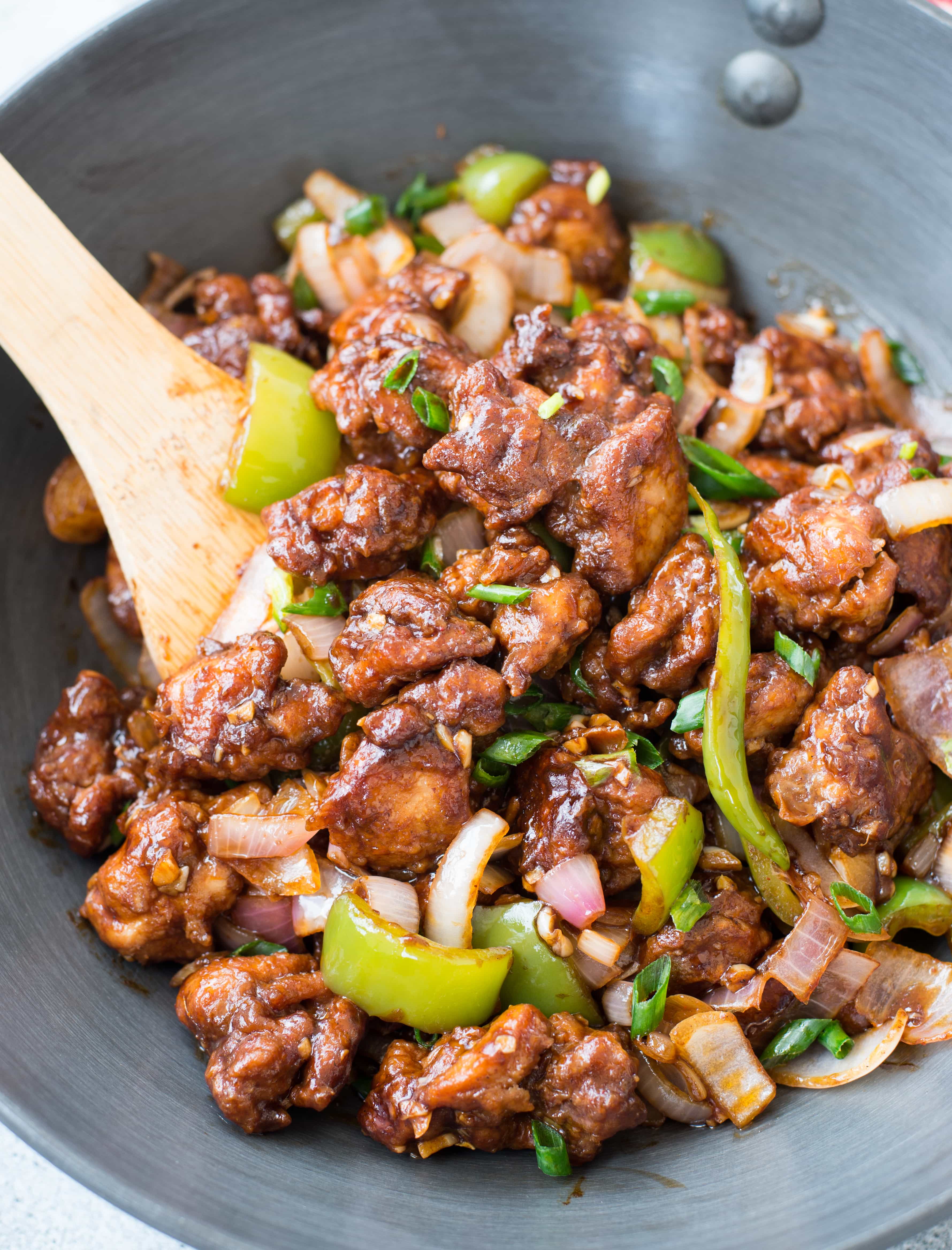  Learn how to make restaurant style Indo Chinese Chili Chicken Dry and Gravy at home with a detailed video. Crispy fried chicken tossed in garlic, onion, capsicum and a spicy Chinese style Sauce.