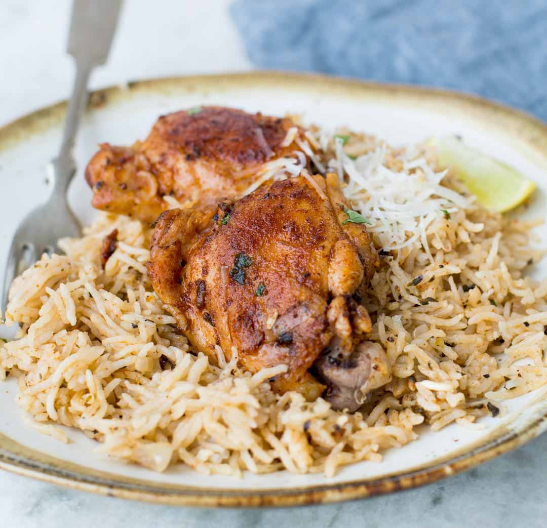 Garlic Herb Chicken and Rice made in the Instant Pot have fluffy buttery rice and Juicy Chicken thighs. This Instant Pot Garlic Herb Chicken and Rice is a wholesome dinner that entire family will love. 