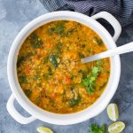 Spinach Red Lentil Soup made in a white Dutch Oven