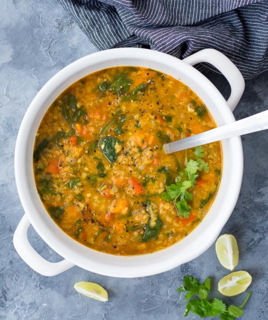 Spinach Red Lentil Soup made in a white Dutch Oven