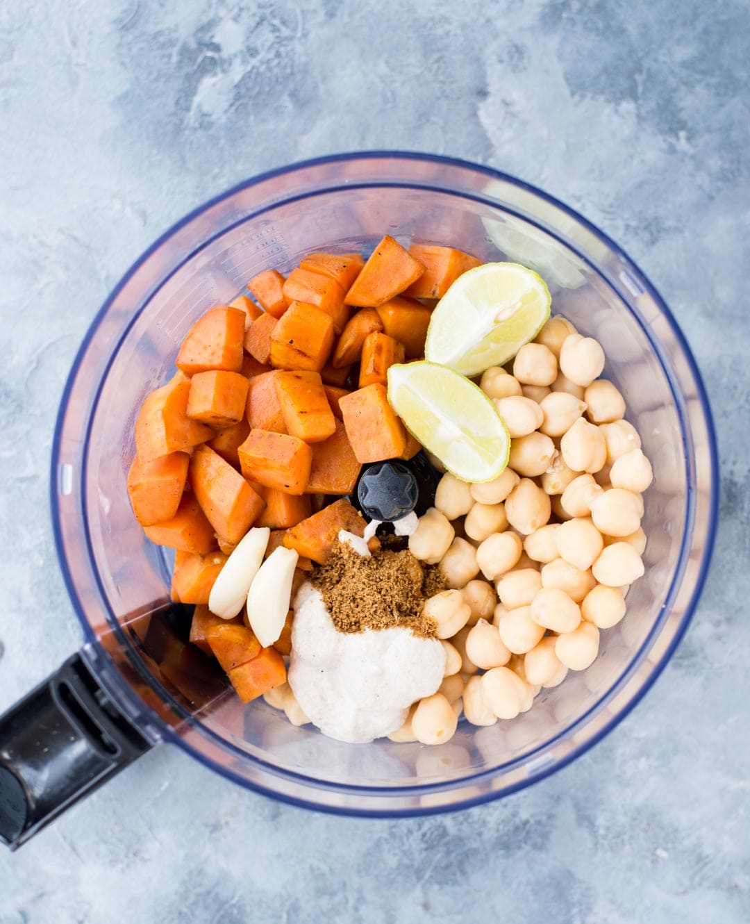 This easy Roasted Sweet Potato Hummus is creamy, delicious and has a hint of sweetness from the Sweet potato. This homemade hummus is great as a dip or as a healthy spread on wraps and sandwiches.