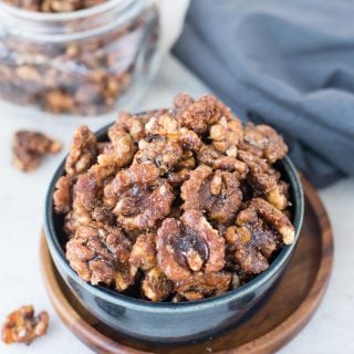 These Candied walnuts are roasted with honey and spices till crunchy, then tossed in brown sugar. Honey Spiced Candied Walnuts are addictive snacks, can be added to salads and perfect for gifting this holiday season.