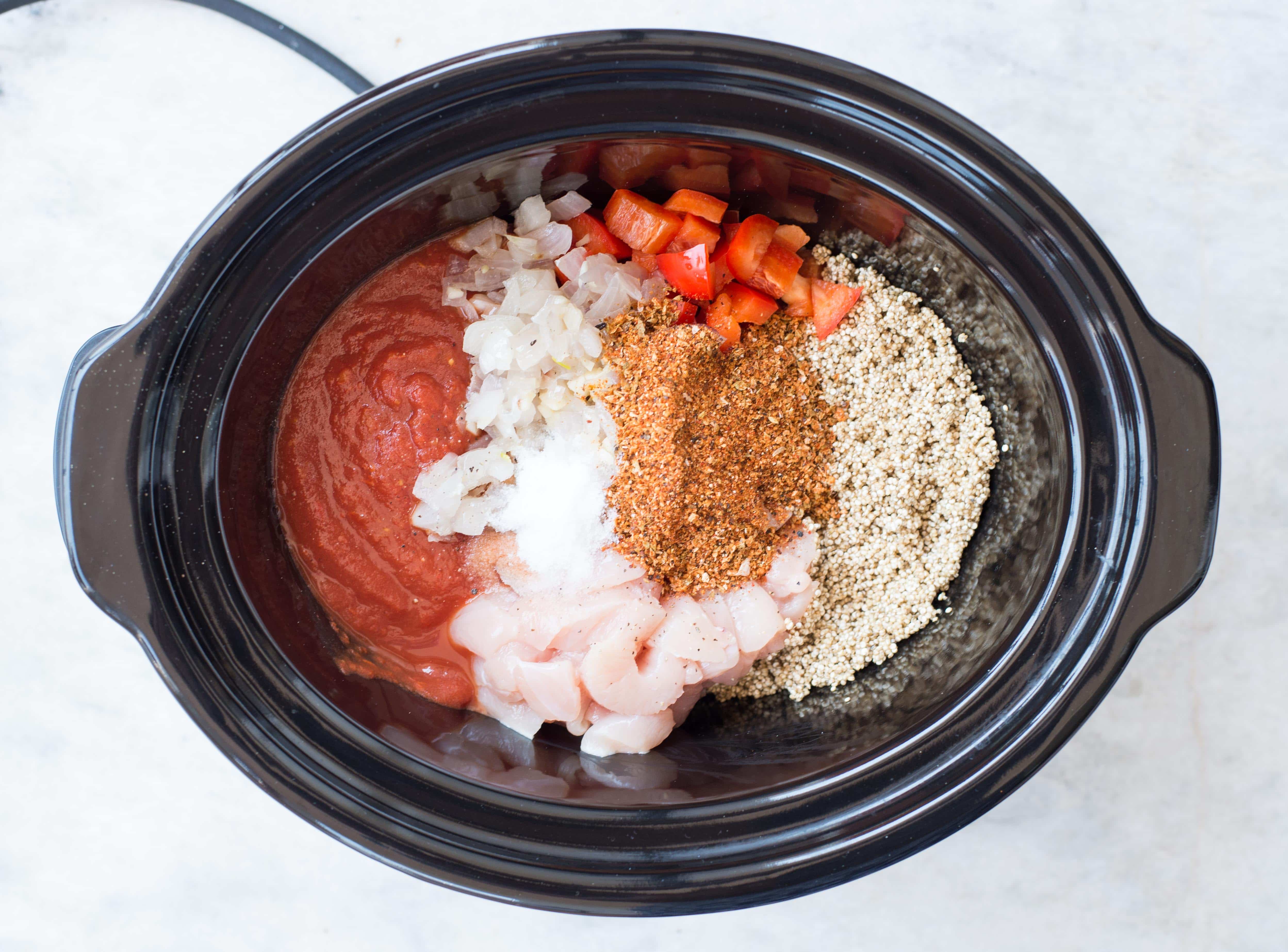 Quinoa, sauteed onions and garlic, bell pepper, and Italian seasoning added to a slow cooker