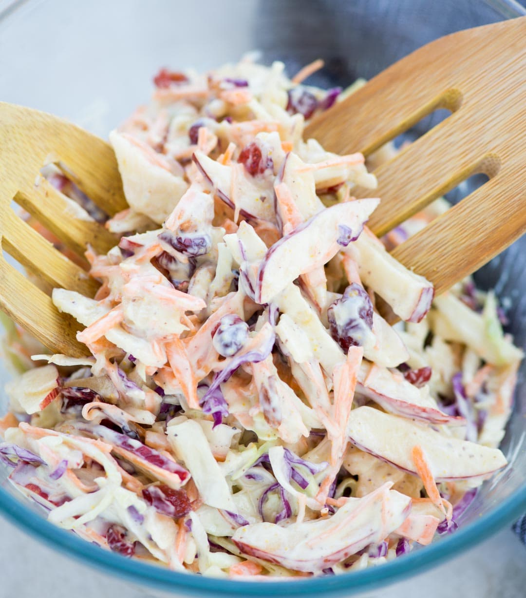 Crunchy apples, Cabbage, carrot, Tart Cranberries in a creamy dressing, this Apple Coleslaw or Apple Slaw is healthy and easy to make. A perfect side dish to serve and can be made in just 10 minutes.