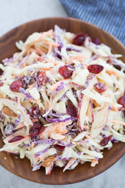 Crunchy apples, Cabbage, carrot, Tart Cranberries in a creamy dressing, this Apple Coleslaw or Apple Slaw is healthy and easy to make. A perfect side dish to serve and can be made in just 10 minutes.