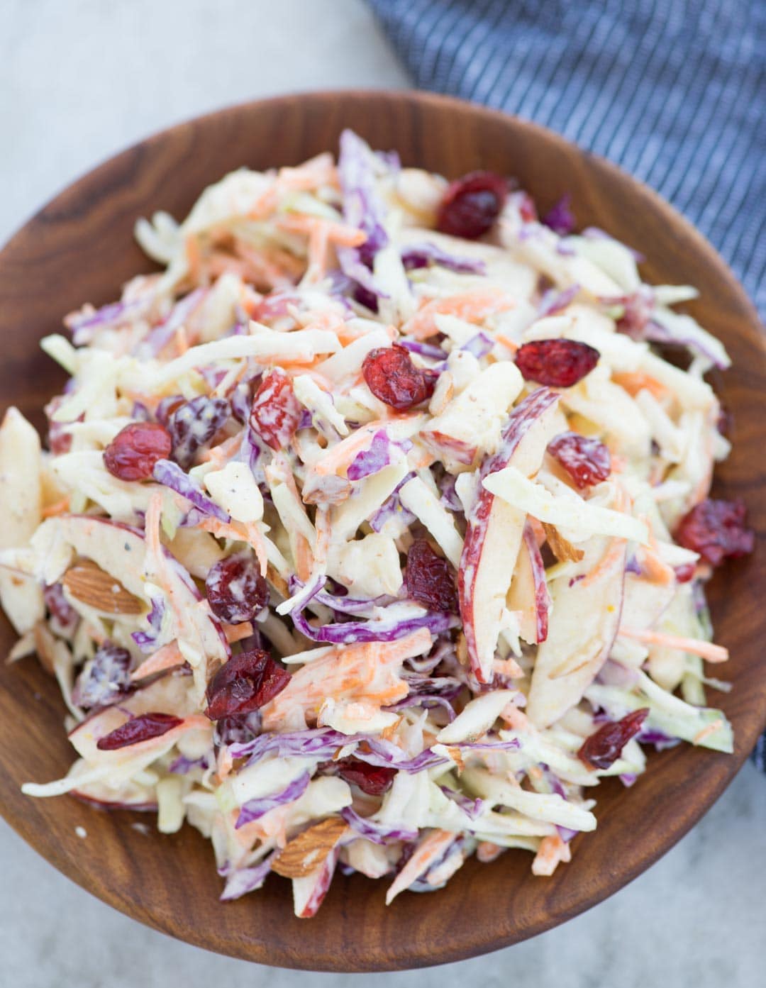 Crunchy apples, Cabbage, carrot, Tart Cranberries in a creamy dressing, this Apple Coleslaw or Apple Slaw is healthy and easy to make. A perfect side dish to serve and can be made in just 10 minutes.