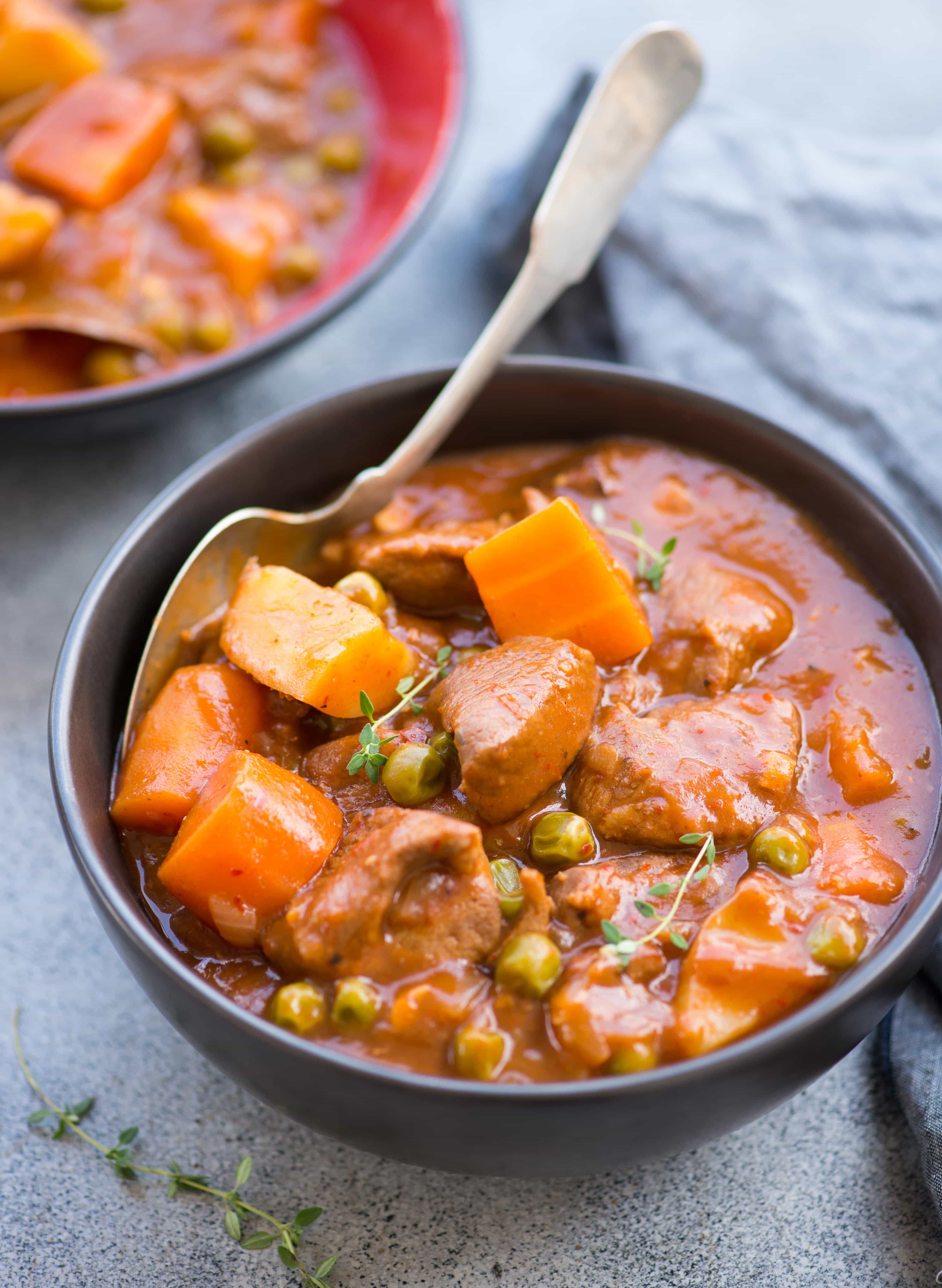 Slow Cooker Lamb Stew with tender fall apart lamb chunks and hearty vegetables have a rustic flavourful wine based gravy. This Lamb Stew is definitely going to keep you warm in the winter.