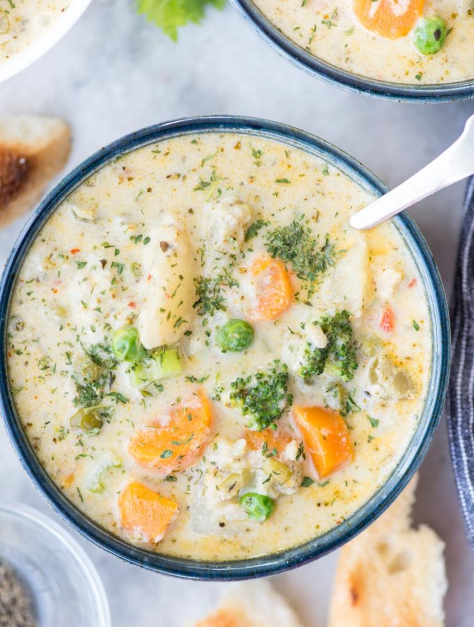 Creamy Vegetable Soup made with loads of vegetable is healthy and gluten-free. The soup has the richness from Parmesan Cheese and is really filling. There are instructions to make this soup both in the Instant Pot and Stovetop.