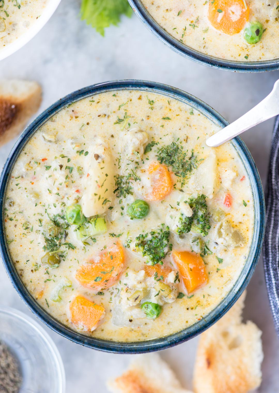 Creamy Vegetable Soup made with loads of vegetable is healthy and gluten-free. The soup has the richness from Parmesan Cheese and is really filling. There are instructions to make this soup both in the Instant Pot and Stovetop.