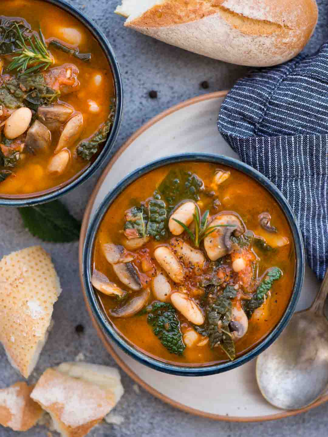 This White Bean Soup with Mushroom and Kale in Tomato based broth is so hearty and delicious. You need only one pot and 20 minutes to make this Soup. Also vegan and gluten-free.