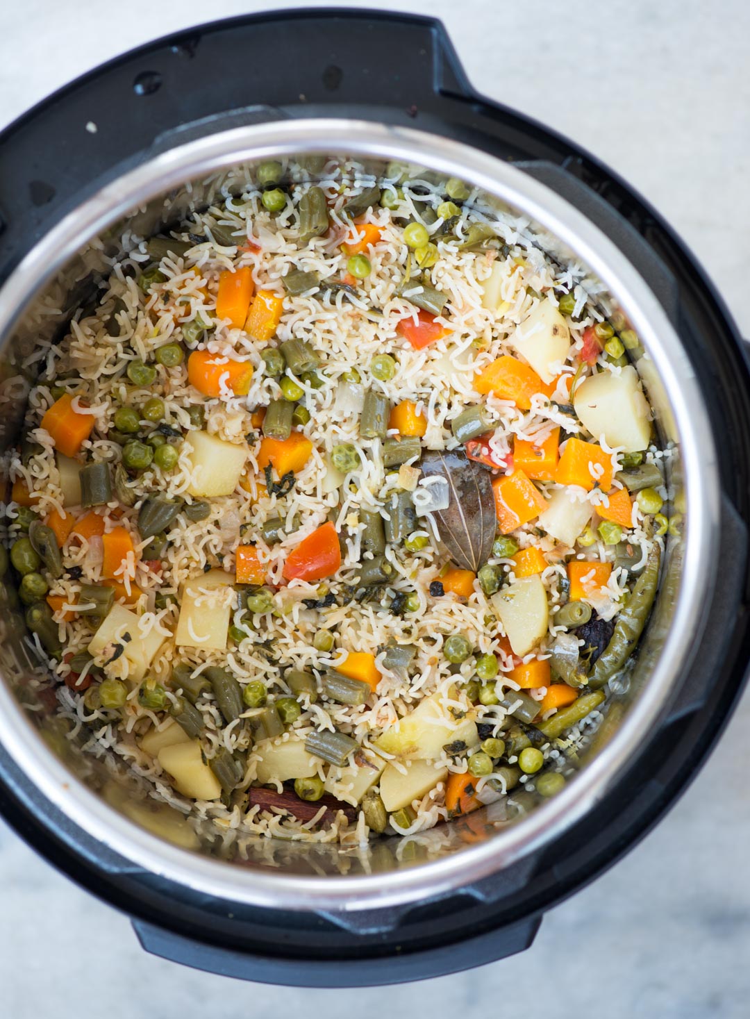 Top shot of vegetable pulao made with whole spices in an Instant Pot
