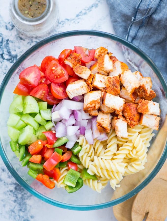 Chicken Pasta Salad for summer barbecues or light lunch. Grilled Chicken, Pasta and veggies tossed in a refreshing Lemon Herb Dressing is so delicious and filled with goodness.