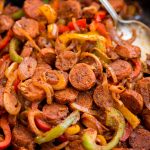 This Cajun Sausage and peppers skillet with caramelized onions, Crunchy peppers,  is so flavourful. You need less than 30 minutes and one pan to make this dinner on a busy weeknight.