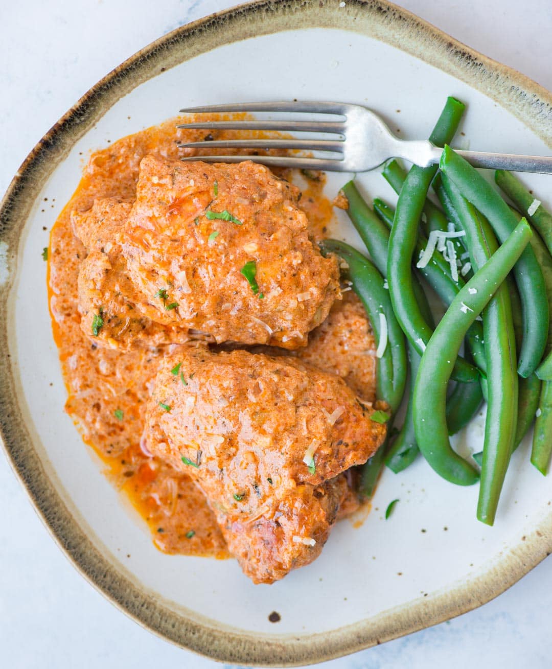 Instant Pot Chicken thighs in a creamy tomato sauce with juicy chicken thighs, buttery tomato sauce is incredibly delicious and takes less than 30 minutes to make.