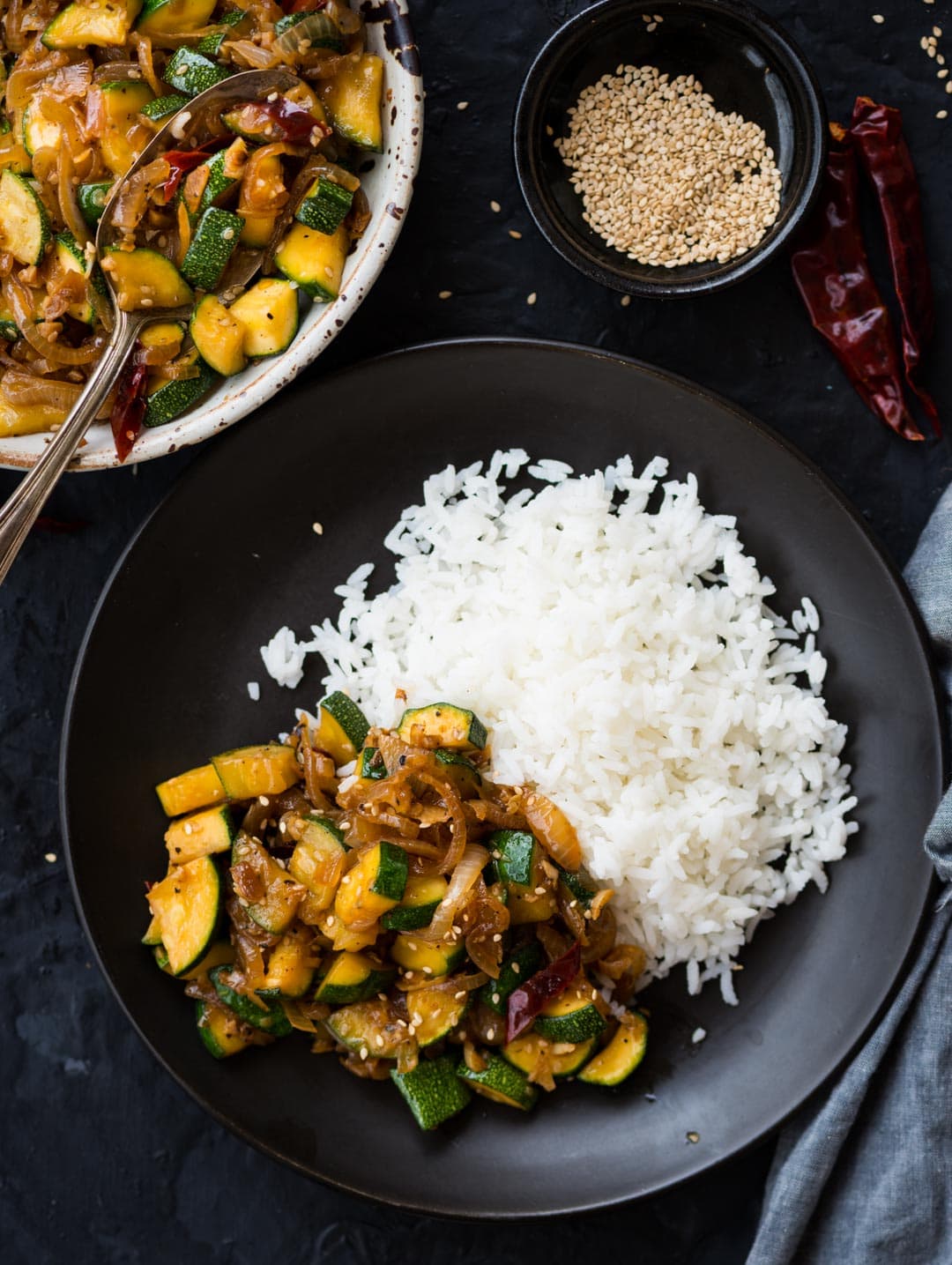 This flavour-packed Zucchini Stir Fry gets ready in 15 mins. Make this super quick stir fry with Onion, Garlic, Zucchini tossed in a simple sauce.