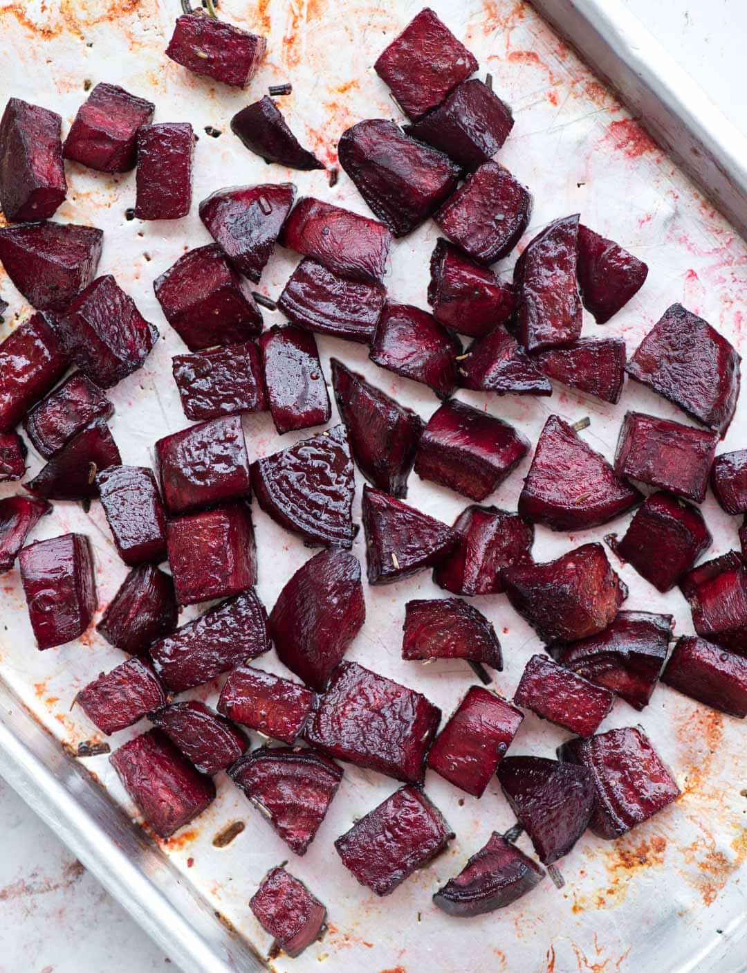 Beetroot chunks roasted on a oven pan