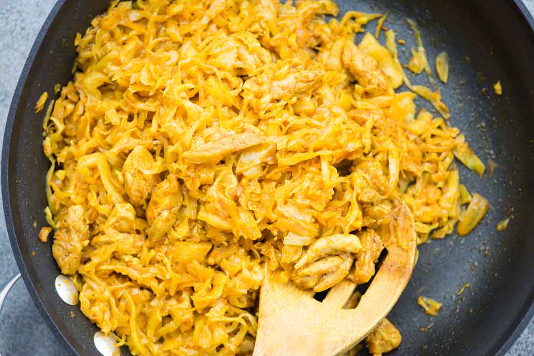 Simple Chicken and Cabbage stir fry with aromatics like garlic and curry powder is really quick to make. This Cabbage stir fry is delicious and low carb.